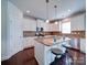 Stylish kitchen with white cabinets, granite countertops, and stainless steel appliances at 1020 Equipoise Dr, Indian Trail, NC 28079