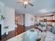 Open concept living room flowing into a modern kitchen with hardwood floors at 1020 Equipoise Dr, Indian Trail, NC 28079