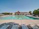 Resort-style community pool with ample seating and a beautiful clubhouse provides the perfect spot for relaxation and recreation at 1020 Equipoise Dr, Indian Trail, NC 28079