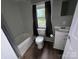Functional bathroom with a tub/shower combination, toilet, and vanity at 1025 Martin Luther King Jr Dr, Albemarle, NC 28001