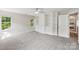 Bedroom with carpet, and custom built-in shelves, cabinets and drawers at 10316 Willingham Rd, Huntersville, NC 28078