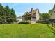 Large backyard features a screened porch and ample space for recreation and relaxation at 10316 Willingham Rd, Huntersville, NC 28078