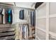 Organized walk-in closet with shelving, hanging racks, and ample storage space at 10316 Willingham Rd, Huntersville, NC 28078