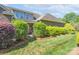 Large fenced-in backyard features mature trees and garden at 11008 Round Rock Rd, Charlotte, NC 28277