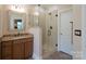 Bathroom featuring granite countertop, tile floors and a glass shower at 11008 Round Rock Rd, Charlotte, NC 28277