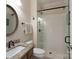 Bathroom showcasing a glass enclosed shower, granite vanity top, decorative mirror and toilet at 11008 Round Rock Rd, Charlotte, NC 28277