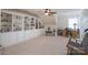 Bonus room includes built-in shelving for storage and display at 11008 Round Rock Rd, Charlotte, NC 28277
