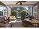 Covered patio with brick surround featuring stone flooring and outdoor seating at 11008 Round Rock Rd, Charlotte, NC 28277