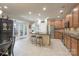 Well-equipped kitchen featuring granite counters, a center island with seating, and ample cabinet space at 11008 Round Rock Rd, Charlotte, NC 28277