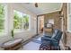 This sun room has many windows for natural lighting and access to the exterior at 11008 Round Rock Rd, Charlotte, NC 28277