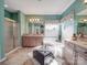 Bathroom boasts a soaking tub, tiled floors, and a separate shower at 1103 Cooper Ln, Indian Trail, NC 28079