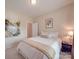 Inviting bedroom with neutral tones, a comfortable bed and decorative artwork at 1103 Cooper Ln, Indian Trail, NC 28079