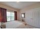 Bedroom featuring natural light, a comfortable bed, and closet space at 1103 Cooper Ln, Indian Trail, NC 28079