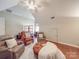 Bright attic living room offers hardwood floors, comfortable seating, and natural light at 1103 Cooper Ln, Indian Trail, NC 28079