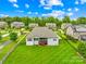 Spacious backyard with a lush green lawn, perfect for outdoor activities and relaxation at 1128 Rosecliff Dr, Marvin, NC 28173