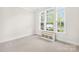 Bright bonus room with large windows offering plenty of natural light at 1128 Rosecliff Dr, Marvin, NC 28173