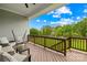 Scenic covered deck with ample seating, overlooking a lush green yard with views at 1128 Rosecliff Dr, Marvin, NC 28173