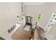 Open and airy foyer with lots of natural light, featuring a chandelier, and hardwood floors at 1149 Grand Oak Dr, Waxhaw, NC 28173