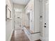 Mudroom with a built-in bench, cubbies, and drawers for storage, and direct access to the laundry room at 1149 Grand Oak Dr, Waxhaw, NC 28173