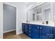 Elegant bathroom featuring dual vanities, quartz countertops, and modern fixtures, offering a spa-like experience at 1244 Saint Johns Ave, Matthews, NC 28104