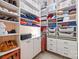 Spacious walk-in closet with custom shelving and storage solutions, providing ample space for organization and style at 1244 Saint Johns Ave, Matthews, NC 28104
