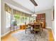 Cozy dining room featuring a bay window, a stylish rug, and a vintage hutch, perfect for memorable gatherings at 1244 Saint Johns Ave, Matthews, NC 28104