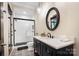 Stylish bathroom with a glass shower, subway tile, and a decorative patterned floor at 13106 Bien Ct, Huntersville, NC 28078