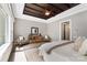 Tranquil main bedroom with a trey ceiling, stylish decor, and natural light for relaxation at 13106 Bien Ct, Huntersville, NC 28078