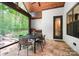 Outdoor dining area featuring stone flooring, fireplace and seating, perfect for al fresco dining and gatherings at 13106 Bien Ct, Huntersville, NC 28078