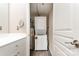 Small laundry area features a washer and dryer combo and utility sink at 1320 Fillmore Ave # 112, Charlotte, NC 28203