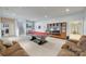 The finished basement features an entertainment area, a pool table, and comfortable seating at 1342 Crown Ridge Dr # 38, Fort Mill, SC 29708