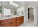 The bathroom includes a double vanity, framed mirrors, and updated fixtures at 1342 Crown Ridge Dr # 38, Fort Mill, SC 29708
