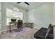 Comfortable bedroom features a dedicated workspace, neutral color scheme, and ample lighting at 1342 Crown Ridge Dr # 38, Fort Mill, SC 29708