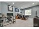 Spacious bedroom with sports memorabilia, a desk, and a large window for natural light at 1342 Crown Ridge Dr # 38, Fort Mill, SC 29708