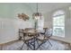 Cozy dining area with modern table set, decorative wall art, and lots of natural light at 1342 Crown Ridge Dr # 38, Fort Mill, SC 29708