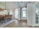 Bright dining room boasting high ceilings, large windows, and a modern light fixture at 1342 Crown Ridge Dr # 38, Fort Mill, SC 29708