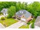 Beautiful brick home featuring a well-kept lawn, attached garage, and inviting curb appeal in a quiet neighborhood at 1342 Crown Ridge Dr # 38, Fort Mill, SC 29708