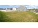Large grassy backyard, perfect for outdoor activities at 138 Maritime St, Mooresville, NC 28117