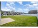 View of the neighborhood and backyard from the grassy yard at 138 Maritime St, Mooresville, NC 28117