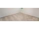This bedroom features neutral carpeting and a bright window at 138 Maritime St, Mooresville, NC 28117