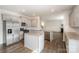Modern kitchen with stainless steel appliances, center island, and granite countertops at 138 Maritime St, Mooresville, NC 28117
