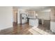 Modern kitchen featuring stainless steel appliances, granite countertops, and hardwood floors at 138 Maritime St, Mooresville, NC 28117