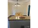 Dining room with hardwood floors, modern lighting, and breakfast bar area at 1400 Lackey St, Shelby, NC 28152