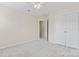 Bedroom featuring a ceiling fan, closet and neutral paint at 15009 Medlock Ln, Charlotte, NC 28277