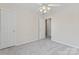 Bedroom featuring a closet, neutral paint, carpeted floors and ceiling fan at 15009 Medlock Ln, Charlotte, NC 28277