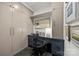 Home office with sleek desk, built-in storage, and contemporary design at 1550 High St, Charlotte, NC 28211