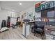 This home office features a standing desk, work area, and storage at 1550 High St, Charlotte, NC 28211