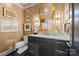 Elegant powder room boasting marble vanity, modern lighting, and sophisticated wallpaper at 1550 High St, Charlotte, NC 28211