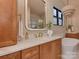 Luxurious bathroom with a marble countertop, elegant fixtures, and a freestanding tub at 1807 Arnold Dr, Charlotte, NC 28205