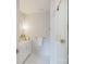 Modern bathroom with a glass shower, white vanity, and neutral walls, creating a serene and functional space at 1807 Arnold Dr, Charlotte, NC 28205